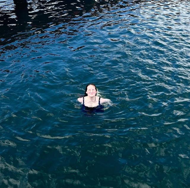 An image of a person swimming in the ocean.