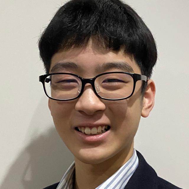 A photo of a smiling boy.