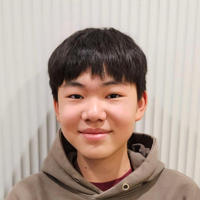 A photo of a smiling boy.