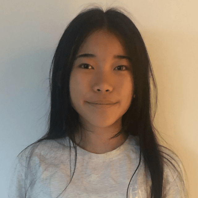 A photo of a girl smiling.