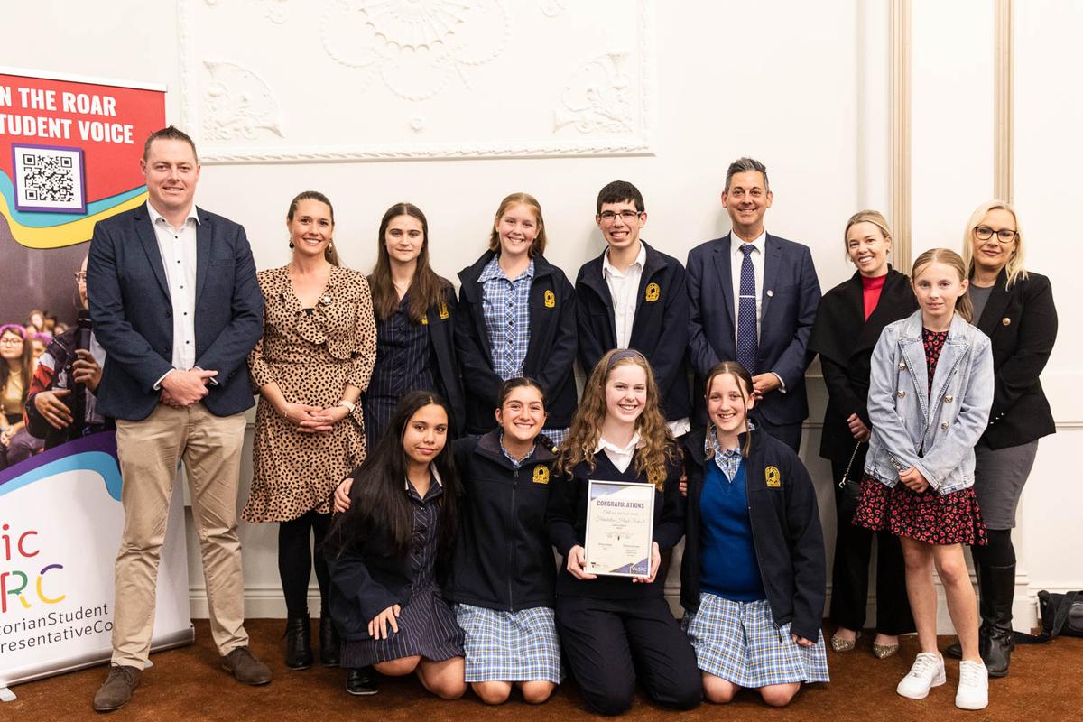 A group of students and teachers from Frankston High School holding their finalist certificate.