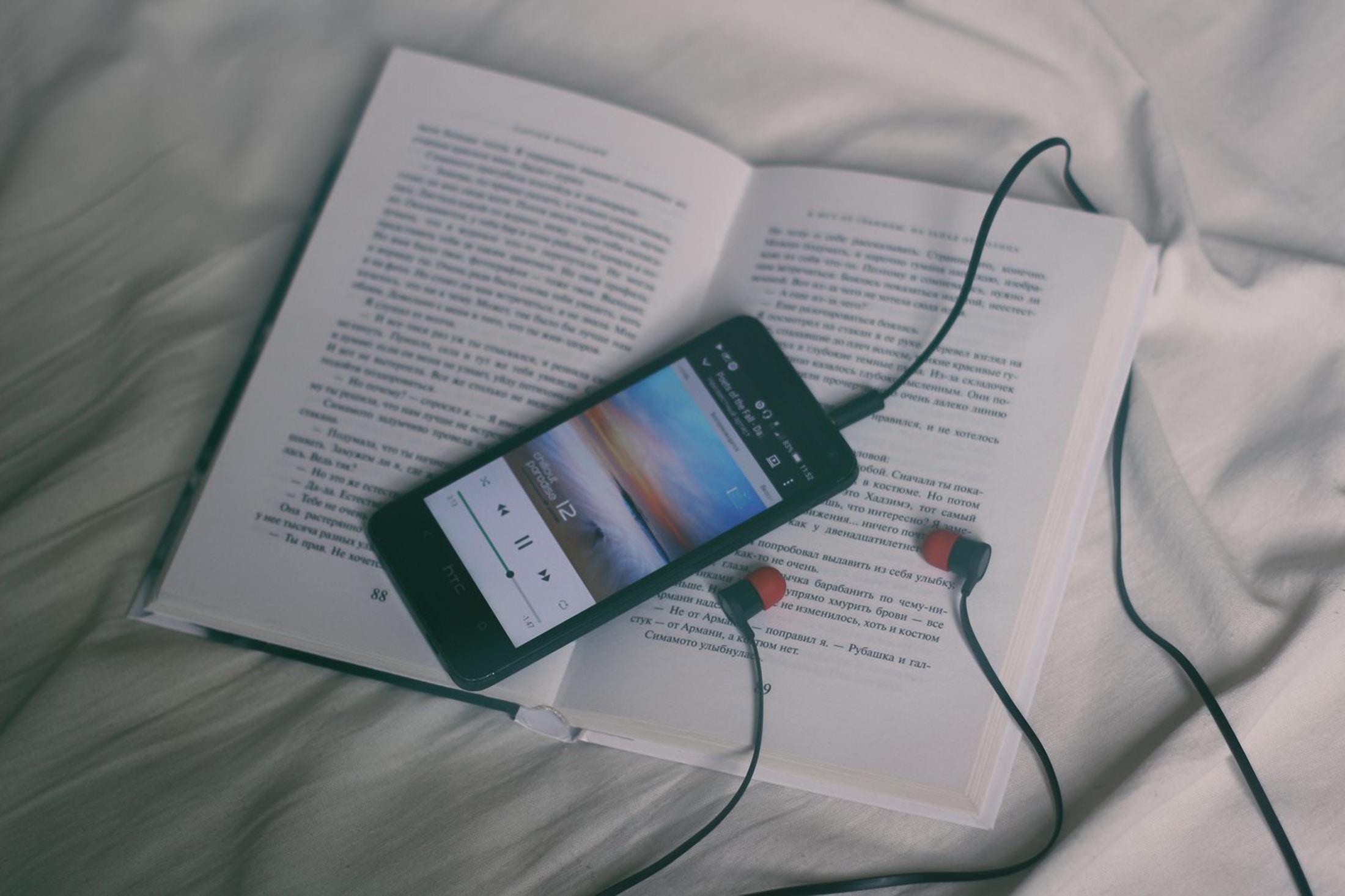 image of book and headphones